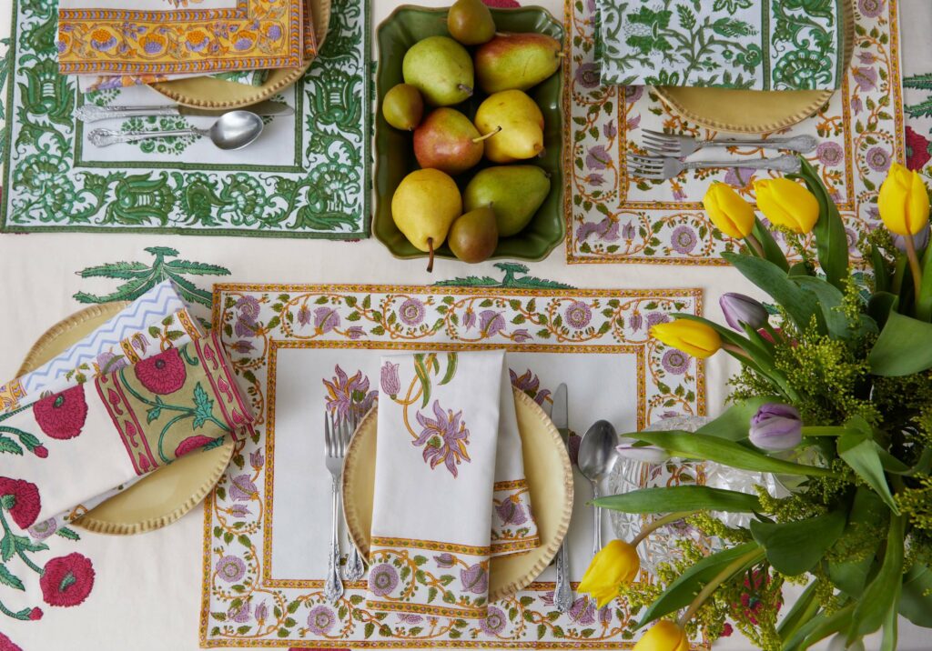 Featuring Marigold Living Indian Block Print table linens including Poppy Magenta, Florence and Gina Lilac, Aria-Riya Green and Juhi Flower Yellow designs.