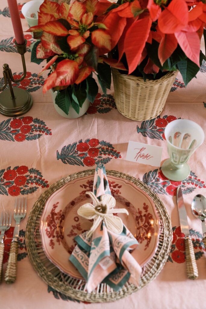 dining set, napkins on a plate, over traditional Indian block printed tablecloth