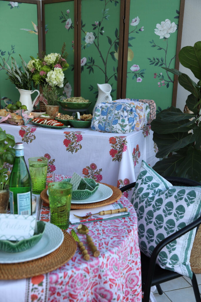 early summer and spring soiree tablescape with finger foods, fizzy drinks, and fresh blooms on indian block printed table linens